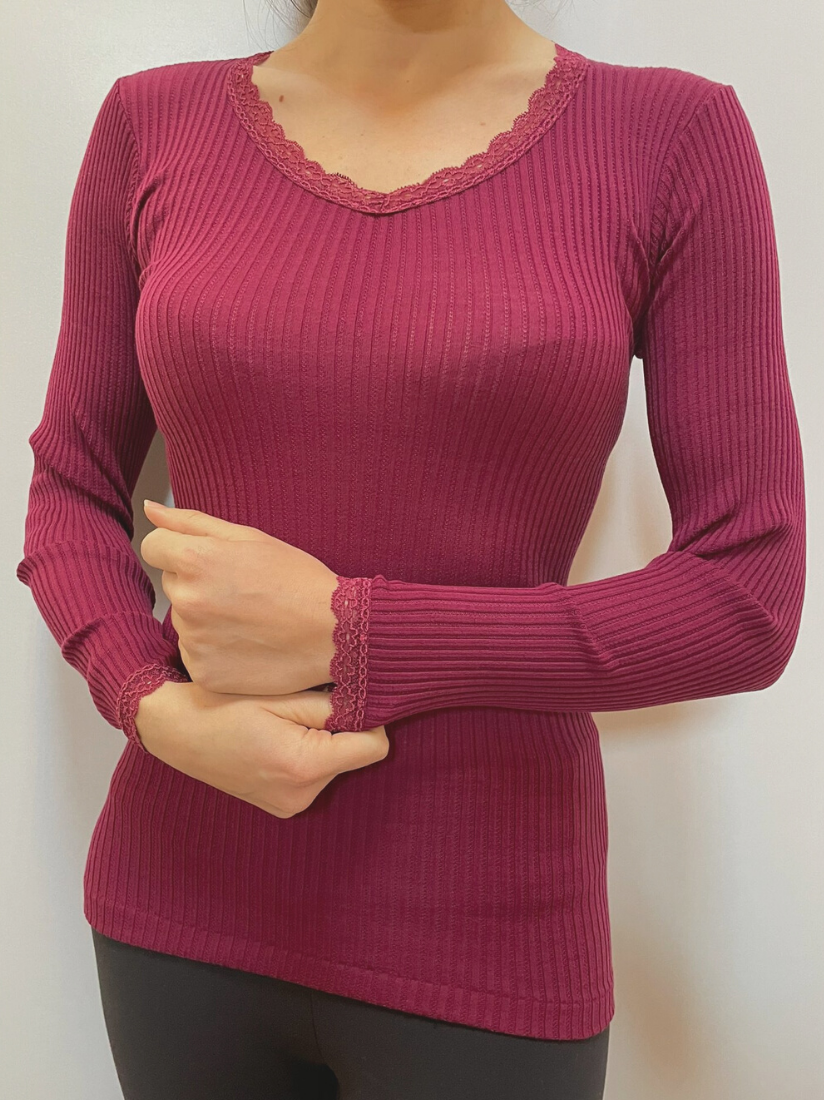 maglia rosa antico con scollo a V in pizzo